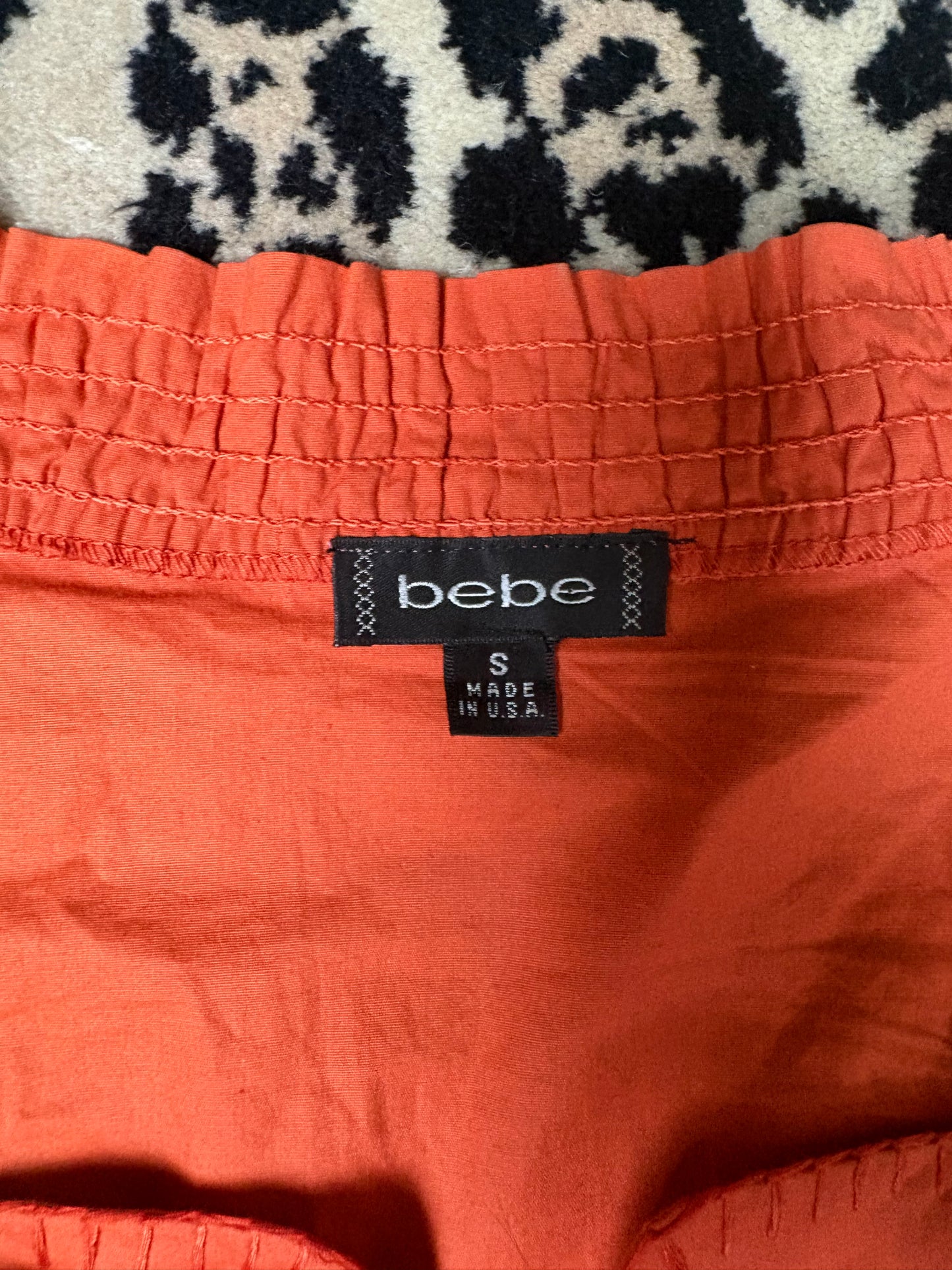 BEBE orange top size S