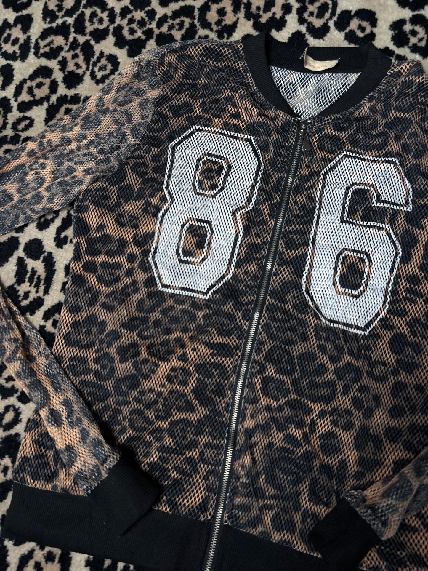 Cheetah fishnet zip up size M